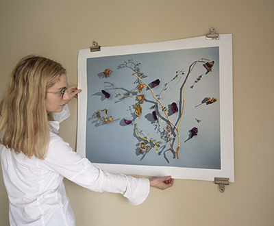 Screen on column in lobby showing water flowing over rocks